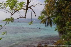 NCL Dawn and a boat seen from Cayo Levantado.jpg