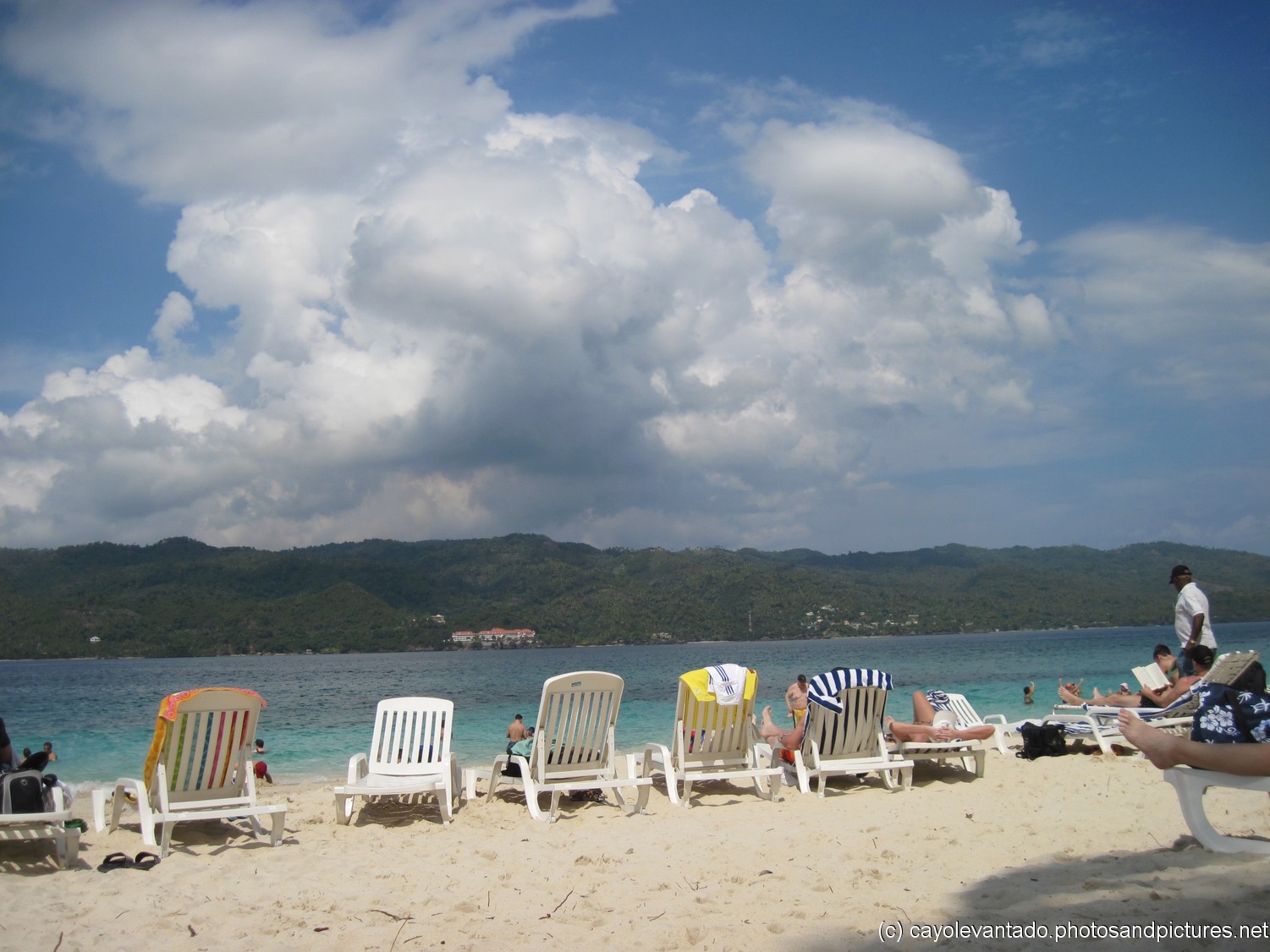 Beachfront beach chairs at Cayo Levantado.jpg