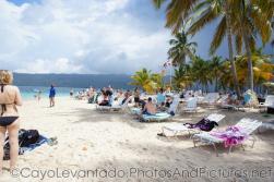 Vacationers at Cayo Levantado beach.jpg