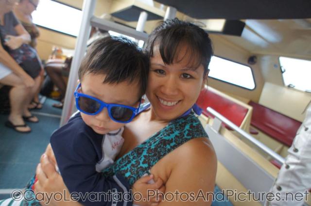 Joann and Darwin aboard tender boat to Cayo Levantado.jpg