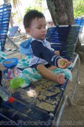 Darwin holds a baby coconut at Cayo Levantado.jpg