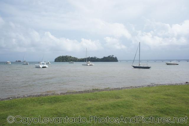 Yachts and catamarans at shore in waters right off of Samana.jpg